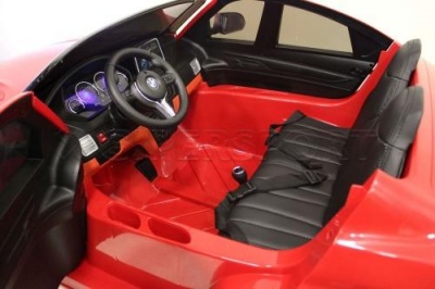Детский электромобиль RiverToys BMW X6 M JJ2168 (красный, белый, черный)
